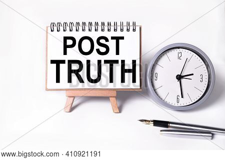 Post Truth. Text On White Notepad Paper On Light Background