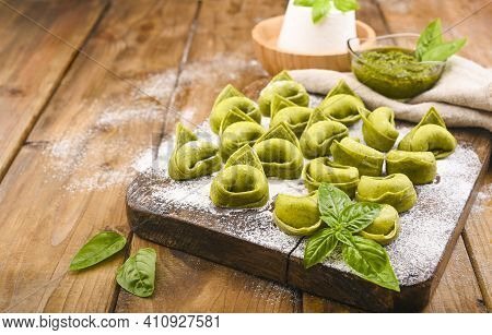 Tortellini E Tortelloni Typical Dishes Emilia Italy. Food Background With Homemade Raw Italian Torte
