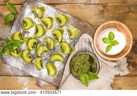 Tortellini E Tortelloni Typical Dishes Emilia Italy. Food Background With Homemade Raw Italian Torte