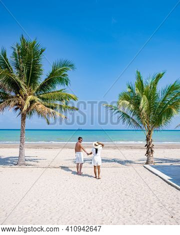Couple On Vacation In Thailand, Chumpon Province, White Tropical Beach With Palm Trees, Wua Laen Bea