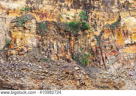 Close Up At A Big Sedimentary Rock Wall At Canyons Of Furnas, Capitólio Mg, Brazil. Rocks With Golde
