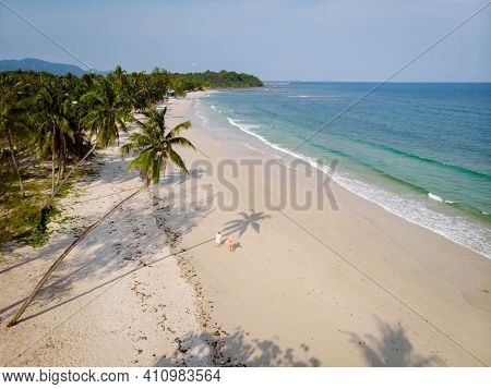 Couple On Vacation In Thailand, Chumpon Province, White Tropical Beach With Palm Trees, Wua Laen Bea