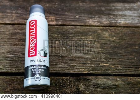 Miercurea Ciuc, Romania- 04 March 2021: Borotalco Invisible Deo Spray On Aged Pine Wood Boards.