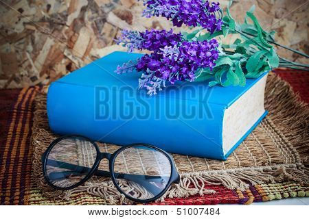 Book And Glasses