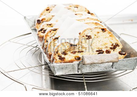 Traditional Christmas Stollen Cake On A Metal Tray