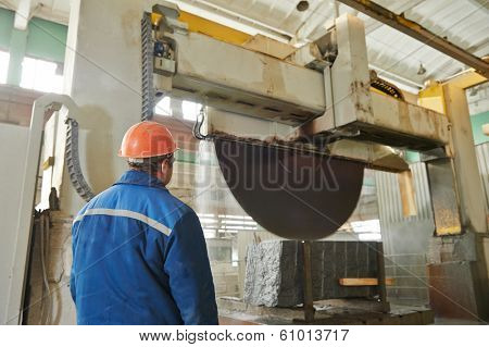 industrial worker at factory on granite or marble manufactur?