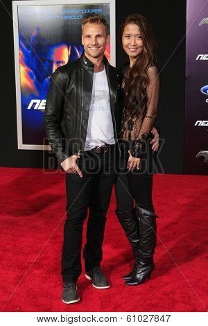 LOS ANGELES - MAR 6: Steve Jordan, Yuki Kimura at the premiere of DreamWorks Pictures' 'Need For Speed' at TCL Chinese Theater on March 6, 2014 in Los Angeles, California