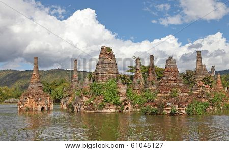 Ancient flooded pagodas in ruins near Samkar village on Inle lake, Shan state, Myanmar 