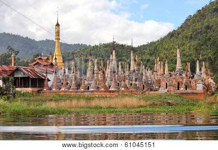 Ancient flooded pagodas in ruins near Samkar village on Inle lake, Shan state, Myanmar 