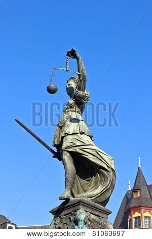 FRANKFURT, GERMANY - JUNE 3, 2012: Statue of Lady Justice in front of the Romer in Frankfurt - Germany