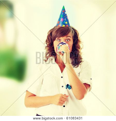 Young woman in business siut wearing party favors