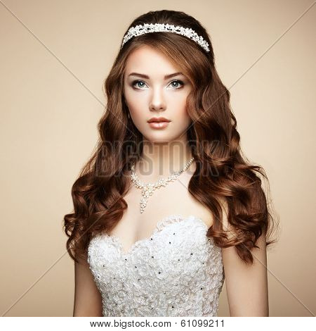 Portrait Of Beautiful Sensual Woman With Elegant Hairstyle. Wedding Dress
