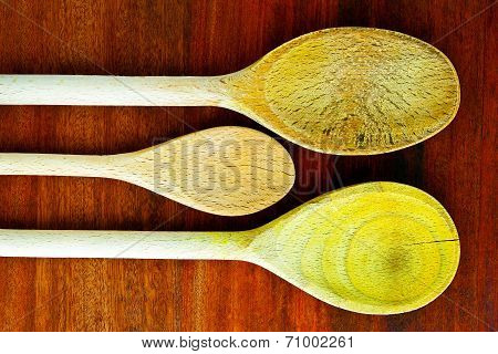 Wooden Spoons On A Dark Surface