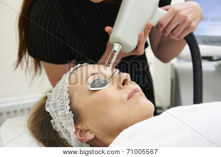 Beautician Carrying Out Fractional Laser Treatment