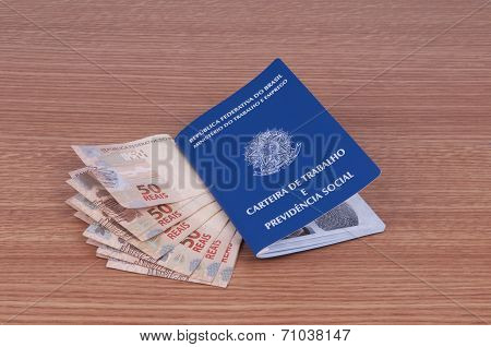 Brazilian Work Document And Social Security Document (carteira De Trabalho) And Brazilian Currency (