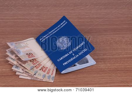 Brazilian Work Document And Social Security Document (carteira De Trabalho) And Brazilian Currency (