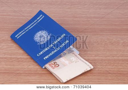 Brazilian Work Document And Social Security Document (carteira De Trabalho) And Brazilian Currency (