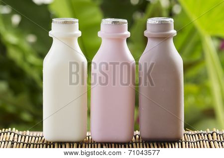 Strawberry, Chocolate And Fresh Milk Bottles