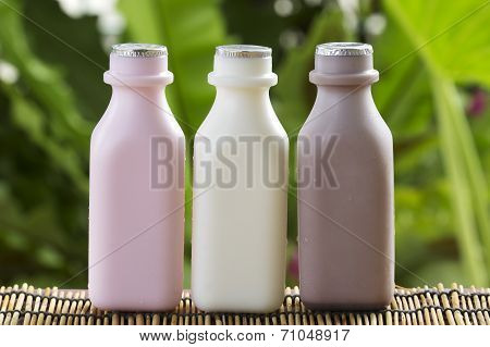 Strawberry, Chocolate And Fresh Milk Bottles