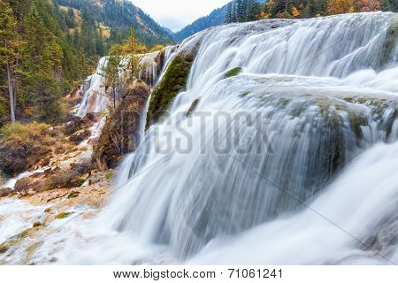Jiuzhaigou Waterfall In Autumn