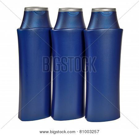 colored plastic bottles with liquid soap and shower gel.