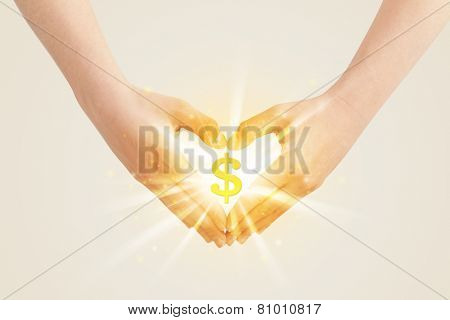 Hands creating a form with shining dollar sign in the center 