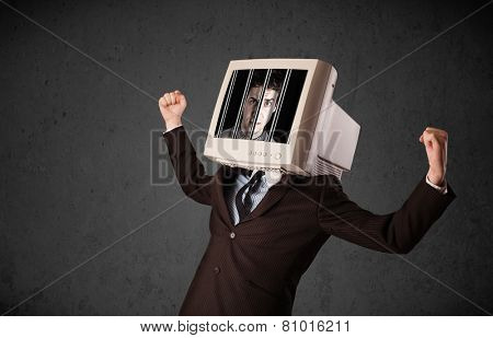 Business man with monitor screen on his head traped into a digital system concept