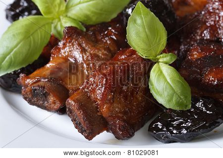 Pork Ribs Stewed With Prunes Macro. Horizontal Top View