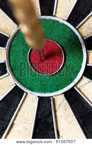 Dartboard With Steeldarts In Bullseye