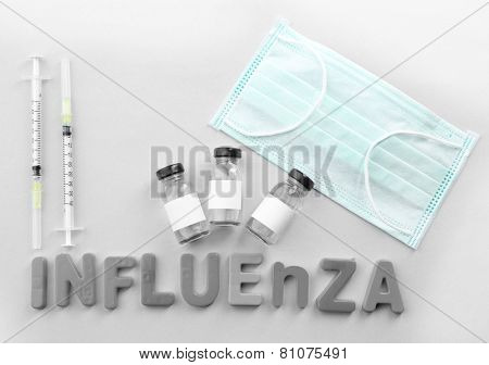 Medicines with word Influenza on light background