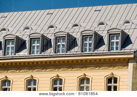old house with a loft, a symbol of living space, expansion, investment