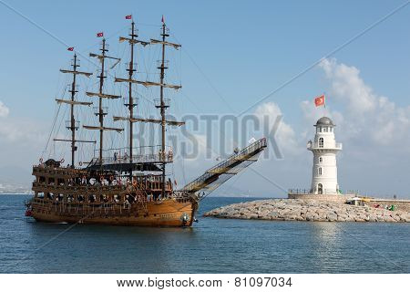 Tourists enjoying sea journey on vintage sailships in Alanya Turkey.