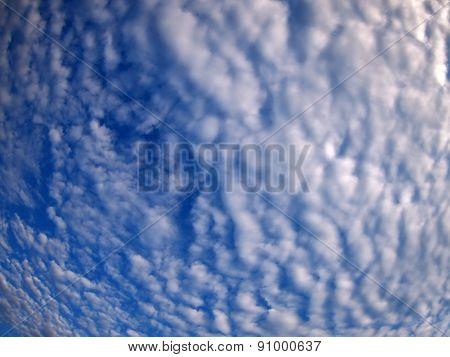 Dense And Stratus Clouds Against The Blue Sky
