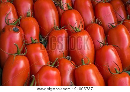 Red Tomatoes In The Market