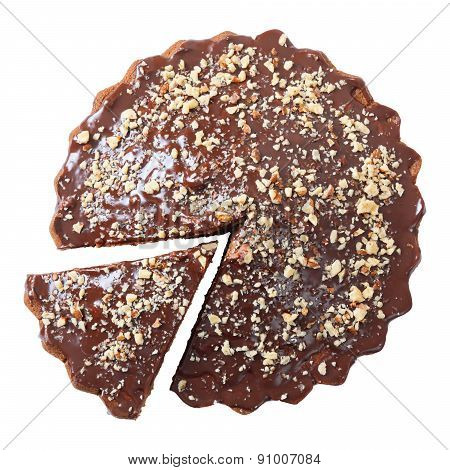 Top View Of Glazed And Sprinkled Pie With Cut Piece