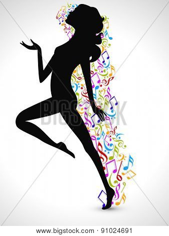 Silhouette of a dancing girl with colorful musical notes on shiny grey background.