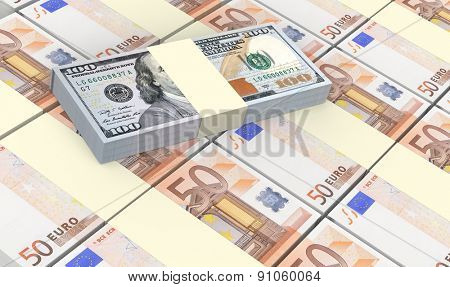 European currency bills stacks with american dollars background.