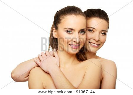 Two attractive sisters with make up.