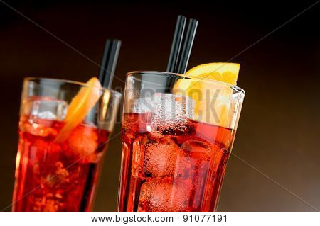 Two Glasses Of Spritz Aperitif Aperol Cocktail With Orange Slices And Ice Cubes