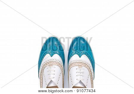 Beautiful blue woman shoes isolated on white background