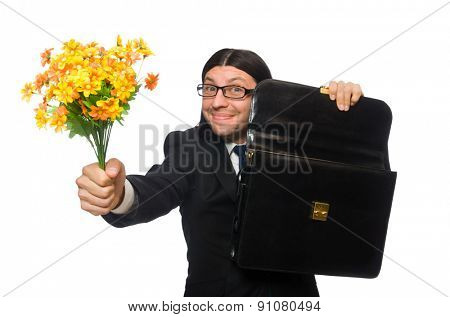 Handsome businessman with flower and brief case isolated on white