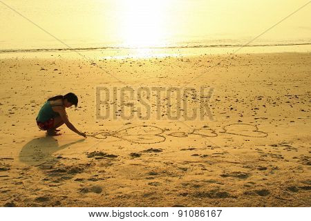 Woman Drawing A Heart Symbol