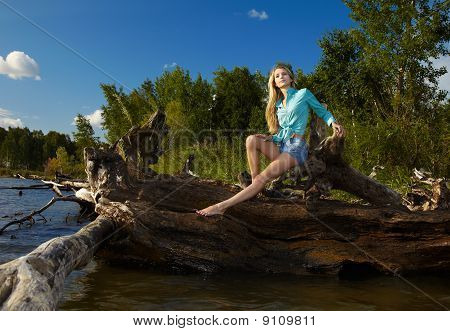 Blonde Posing Near Flotsam