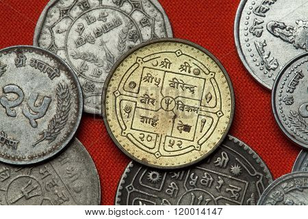 Coins of Nepal. Hindu trishul depicted in the Nepalese rupee coin.
