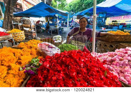 GIANYAR, INDONESIA - FEB 28, 2016: Unidentified local street vendor. Since the beginning of the XXI century the Bali's population increased by more than a million people, now more than 4,2 million.