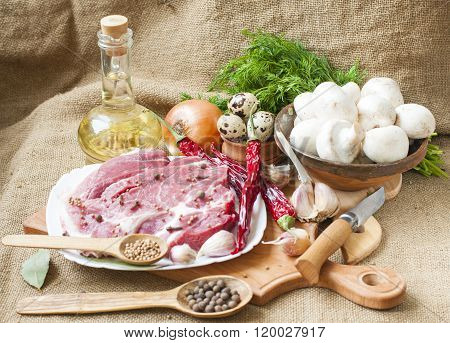 Fresh Meat With Mushrooms Spices And Herbs.