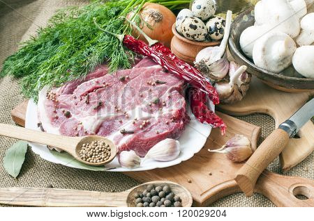 Fresh Meat With Mushrooms Spices And Herbs.