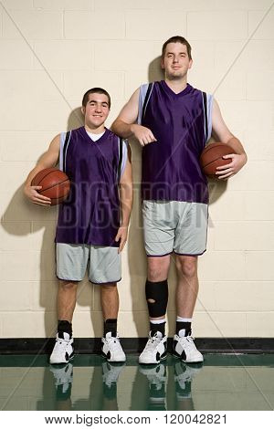 Tall and short basketball players