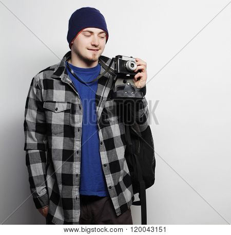 young  photographer over white background