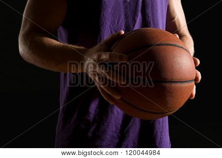 Man holding basketball